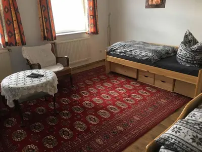 Ein Bett oder Betten in einem Zimmer der Unterkunft Pension zur Schmied'n