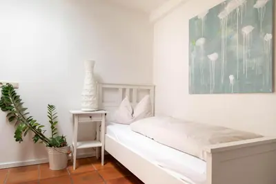 Ein Bett oder Betten in einem Zimmer der Unterkunft Fischerstüberl Attel