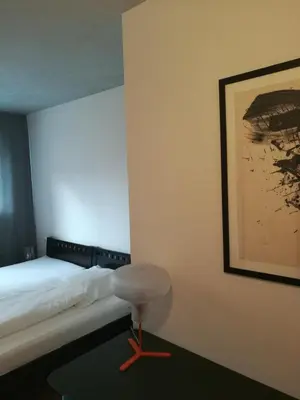 Ein Bett oder Betten in einem Zimmer der Unterkunft Hotel Sonderborg