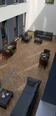 Ein Sitzbereich in der Unterkunft Hotel Starton am Ingolstadt Village