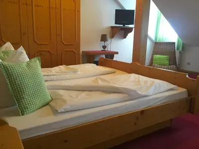 Ein Bett oder Betten in einem Zimmer der Unterkunft Landgasthof Kirchmayer