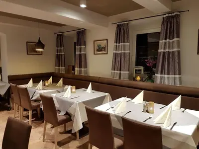 Ein Sitzbereich in der Unterkunft Landgasthof Kirchmayer