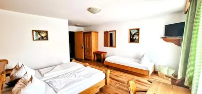 Ein Bett oder Betten in einem Zimmer der Unterkunft Landgasthof Kirchmayer