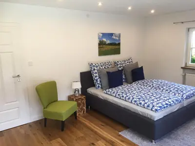 Ein Bett oder Betten in einem Zimmer der Unterkunft Ferienwohnung Laurin