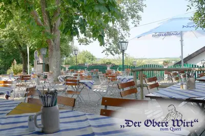 Ein Restaurant oder anderes Speiselokal in der Unterkunft Der Obere Wirt zum Queri