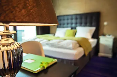 Ein Bett oder Betten in einem Zimmer der Unterkunft Hotel zum See