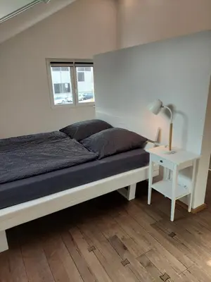 Ein Bett oder Betten in einem Zimmer der Unterkunft Ferienhaus Landsberg