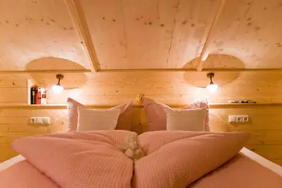 Ein Bett oder Betten in einem Zimmer der Unterkunft Almhaus Webermohof