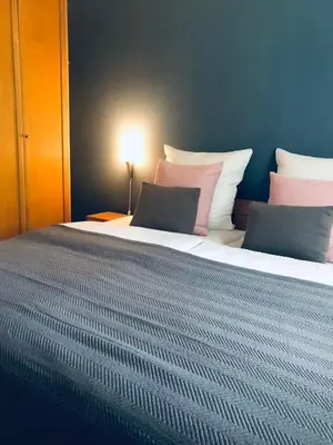 Ein Bett oder Betten in einem Zimmer der Unterkunft Wanderlust Chiemgau