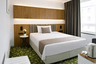Ein Bett oder Betten in einem Zimmer der Unterkunft Hotel Bayer's