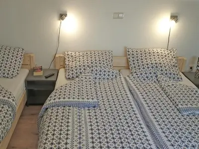 Ein Bett oder Betten in einem Zimmer der Unterkunft Ruhiges Apartment mit Sauna, Burggen