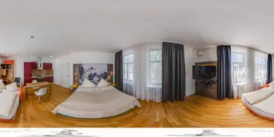Ein Bett oder Betten in einem Zimmer der Unterkunft Alpina home