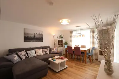 Ein Sitzbereich in der Unterkunft Sweet Home & Flower Garden