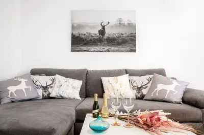 Ein Sitzbereich in der Unterkunft Sweet Home & Flower Garden