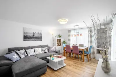 Ein Sitzbereich in der Unterkunft Sweet Home & Flower Garden