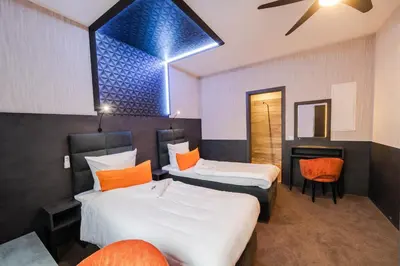 Ein Bett oder Betten in einem Zimmer der Unterkunft premium by GS Hotel