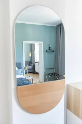 Ein Bett oder Betten in einem Zimmer der Unterkunft Hotel Garni Goldammer