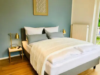 Ein Bett oder Betten in einem Zimmer der Unterkunft Hotel Garni Goldammer