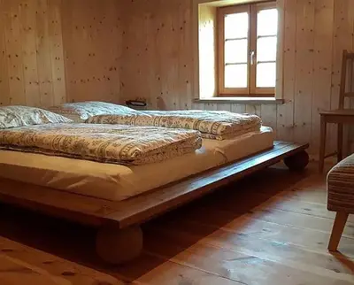 Ein Bett oder Betten in einem Zimmer der Unterkunft Biohof Neihausmo