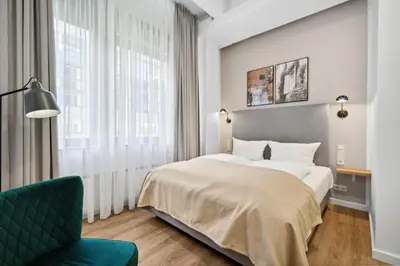 Ein Bett oder Betten in einem Zimmer der Unterkunft Limehome Munich Fritz-Erler Str