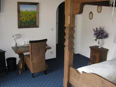 Ein Bett oder Betten in einem Zimmer der Unterkunft Panoramahotel Karwendelhof