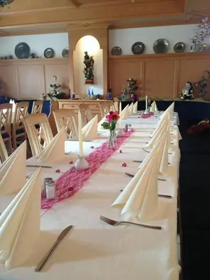 Ein Restaurant oder anderes Speiselokal in der Unterkunft Landgasthof Stangl