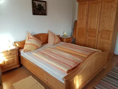 Ein Bett oder Betten in einem Zimmer der Unterkunft Brausamhof