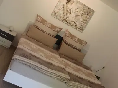 Ein Bett oder Betten in einem Zimmer der Unterkunft Ferienwohnung Staudacher