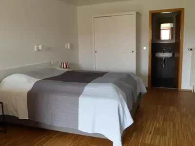 Ein Bett oder Betten in einem Zimmer der Unterkunft Truchtling Appartements