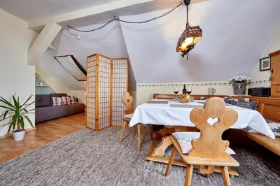 Ein Sitzbereich in der Unterkunft Apartments Alte Villa