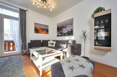 Ein Sitzbereich in der Unterkunft Apartments Alte Villa