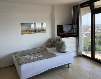 Ein Bett oder Betten in einem Zimmer der Unterkunft Hotelturm Apartment