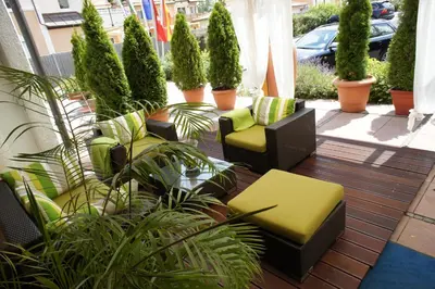 Ein Sitzbereich in der Unterkunft Hotel am Krone Park