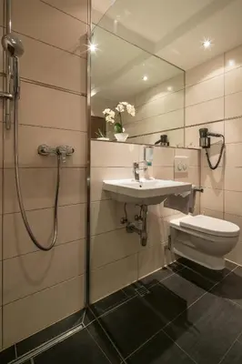 Ein Badezimmer in der Unterkunft Hotel am Krone Park