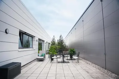 Ein Balkon oder eine Terrasse in der Unterkunft Hotel Garni Fischerfleck in Ismaning near Munich