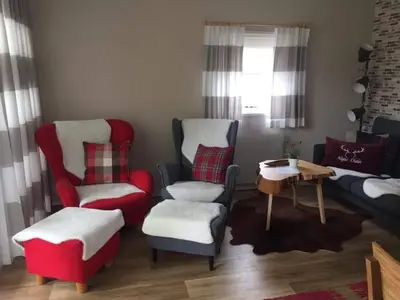 Ein Sitzbereich in der Unterkunft Allgäu-Chalet
