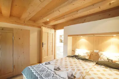 Ein Bett oder Betten in einem Zimmer der Unterkunft Ansitz Parstorfer