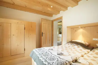 Ein Bett oder Betten in einem Zimmer der Unterkunft Ansitz Parstorfer
