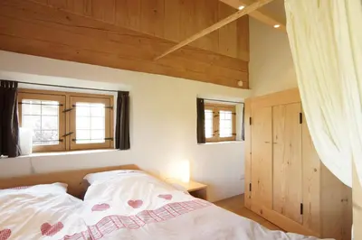 Ein Bett oder Betten in einem Zimmer der Unterkunft Ansitz Parstorfer