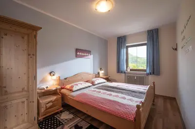Ein Bett oder Betten in einem Zimmer der Unterkunft Ferienwohnanlage Bergschlößl Appartement Nr18