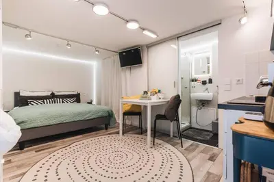 Ein Bett oder Betten in einem Zimmer der Unterkunft Souterrain Solln 20min Oktoberfest/Zentrum