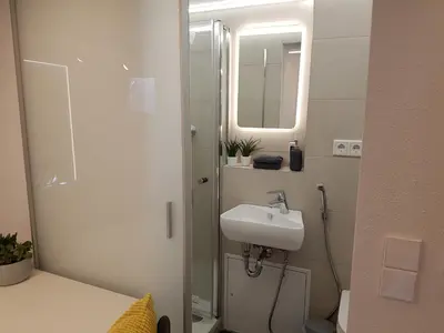 Ein Badezimmer in der Unterkunft Souterrain Solln 20min Oktoberfest/Zentrum