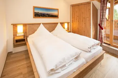 Ein Bett oder Betten in einem Zimmer der Unterkunft Chiemsee Hauszeit