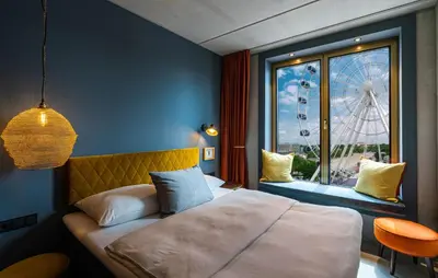 Ein Bett oder Betten in einem Zimmer der Unterkunft gambino hotel WERKSVIERTEL