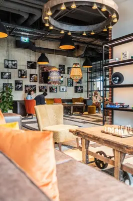 Ein Sitzbereich in der Unterkunft gambino hotel WERKSVIERTEL