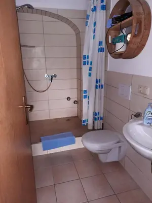 Ein Badezimmer in der Unterkunft Ferienhof Mühlthal