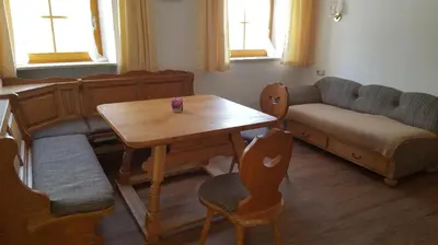 Ein Sitzbereich in der Unterkunft Ferienhof Mühlthal