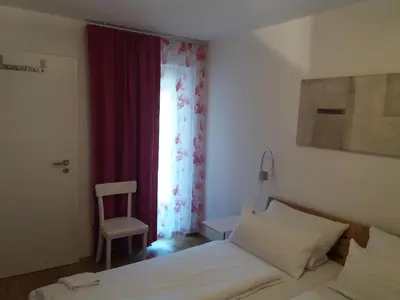 Ein Bett oder Betten in einem Zimmer der Unterkunft Ferienwohnung Adlmaier
