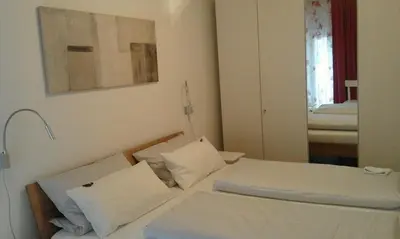 Ein Bett oder Betten in einem Zimmer der Unterkunft Ferienwohnung Adlmaier