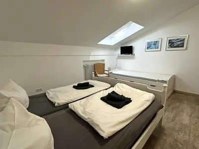Ein Bett oder Betten in einem Zimmer der Unterkunft Gschwendtnerhof App14 Ludes-Ennen